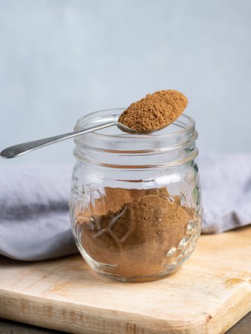 Spoonful on a jar of spices.