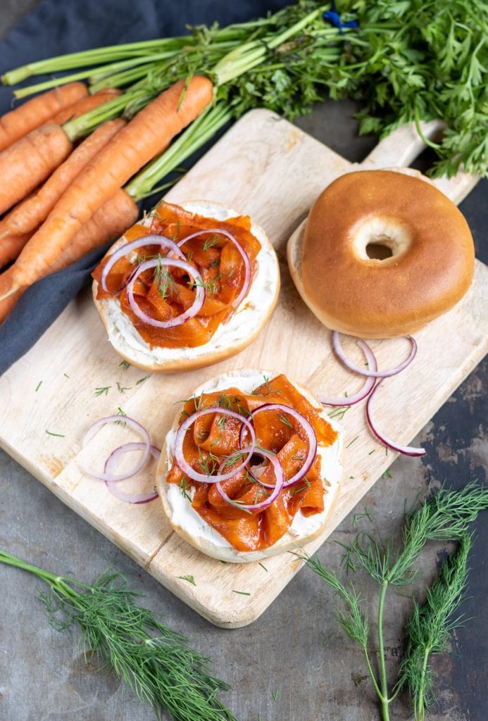 A bread board with Vegan Lox on bagels.