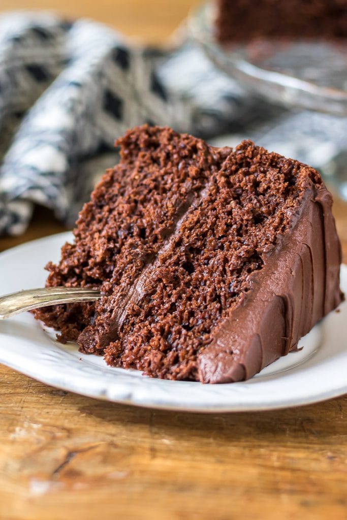 Close up of a slice of cake with a fork.