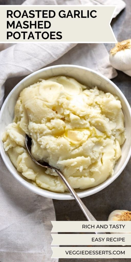 Bowl of potatoes with text: Roasted Garlic Mashed Potatoes.