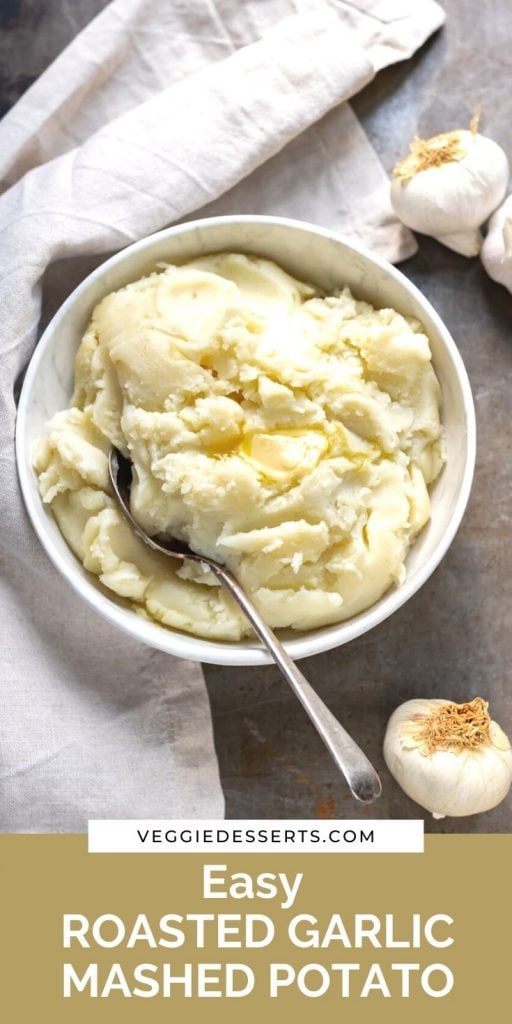 Bowl of potatoes with text: Roasted Garlic Mashed Potatoes.