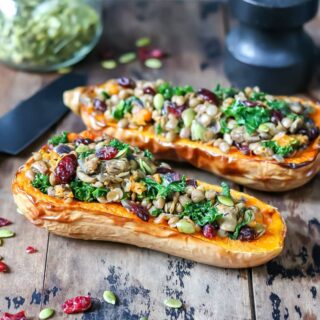 Stuffed squash halves on a table.