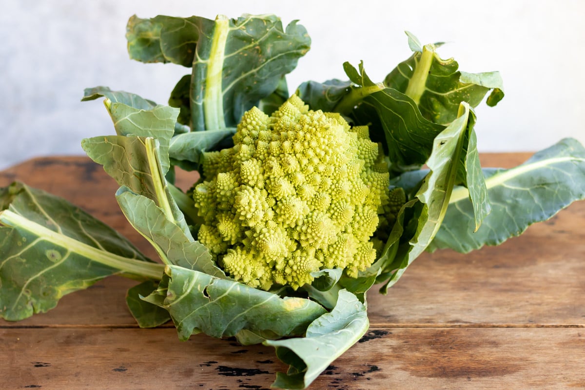 A raw, whole romanesco.