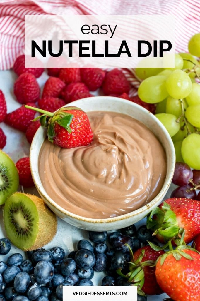 Bowl of dip with fruit and text: Easy Nutella Dip.