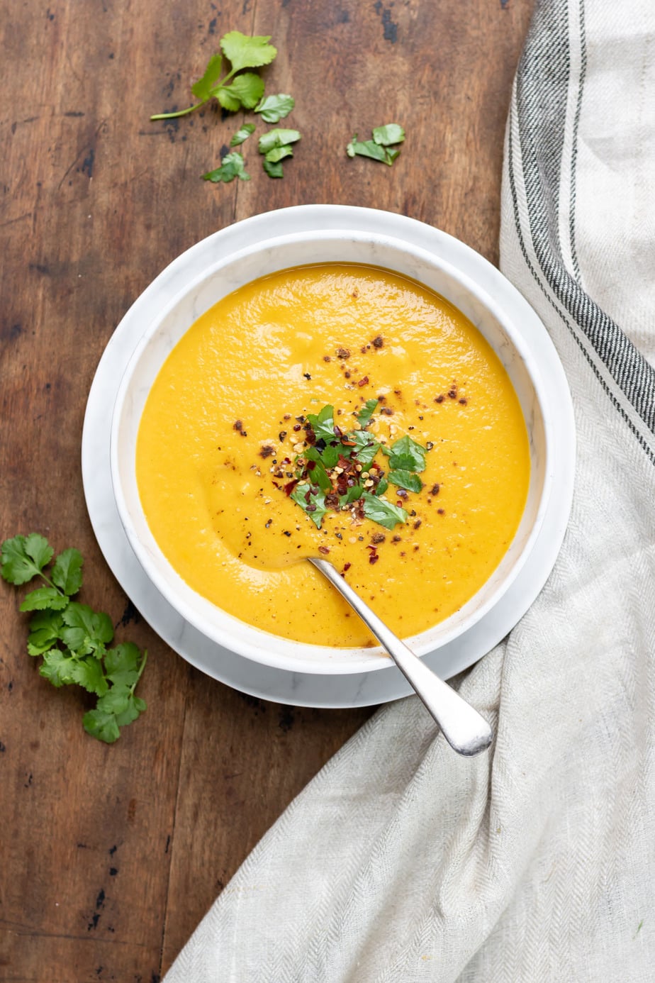 Bowl of soup on a table.