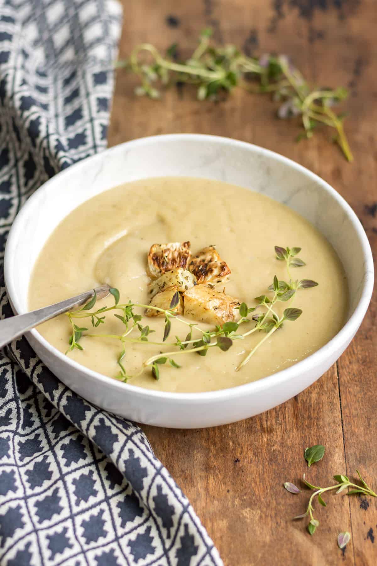 Spoon in a bowl of soup.