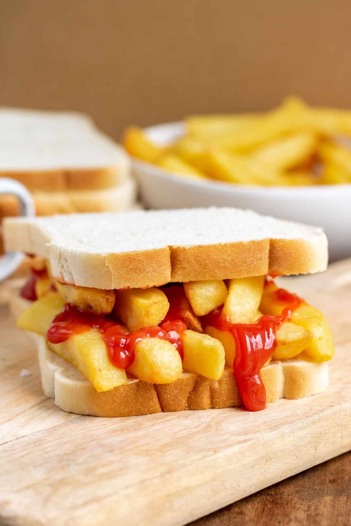 Close up of a french fry sandwich.