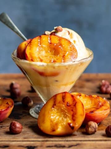 Bowls of ice cream with grilled maple nectarines.