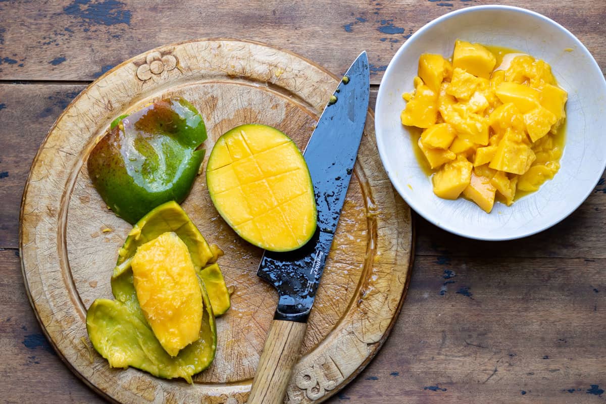 Chopping mango.