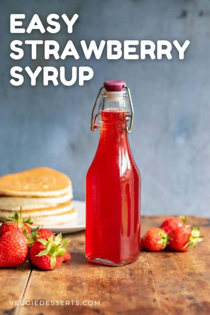 Bottle of syrup with text: easy strawberry syrup.