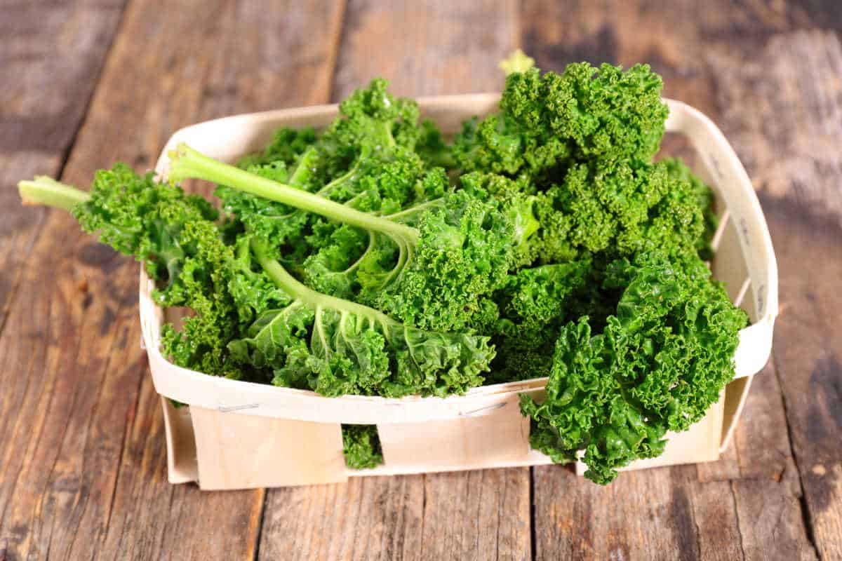 Kale in a wooden basket.