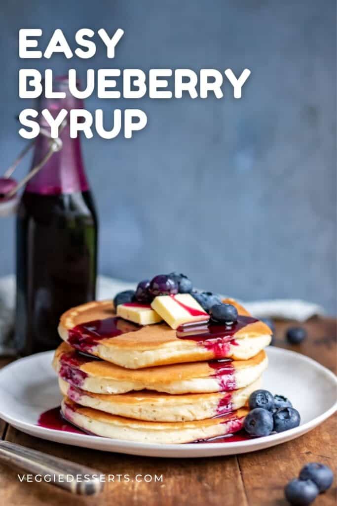 Stack of pancakes with blueberry syrup.