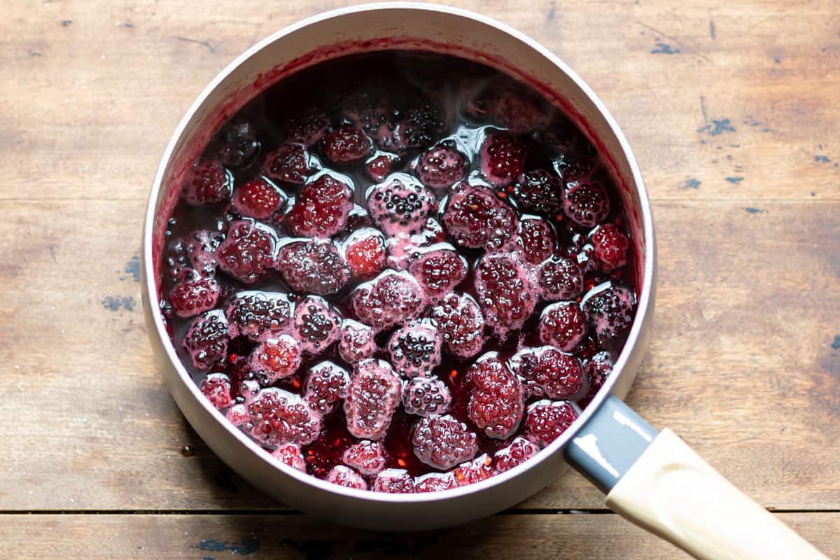 Pan of cooked blackberries.