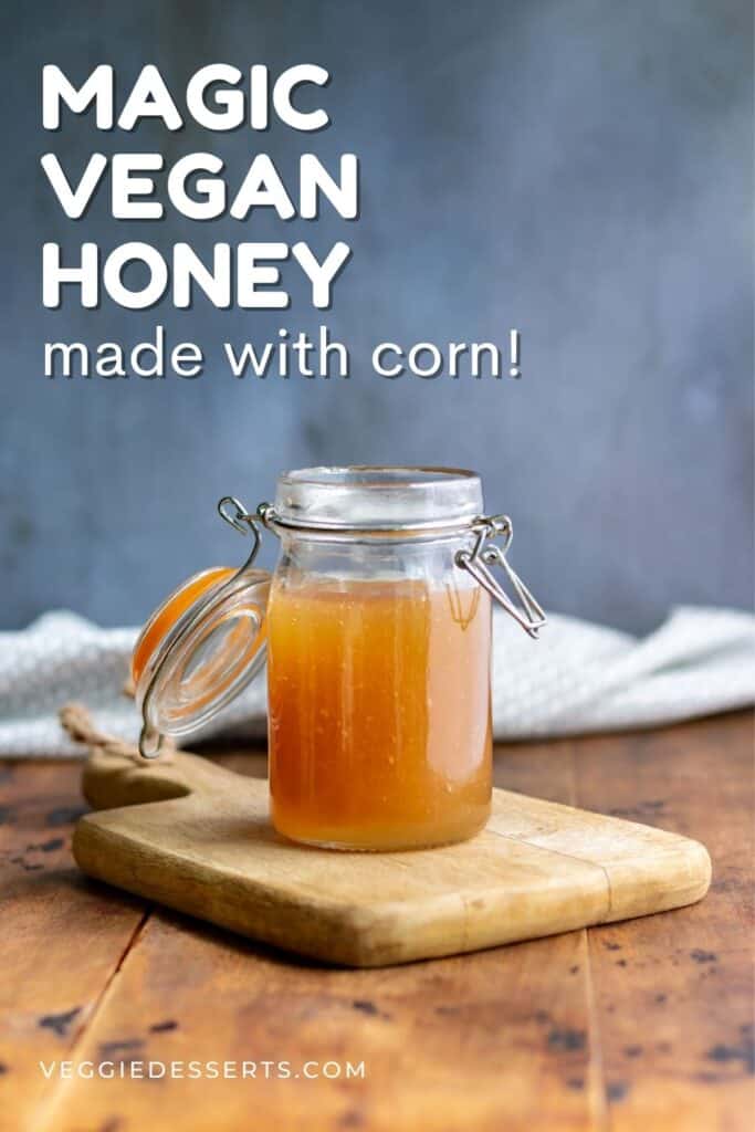 Jar on a table, with text: Magic Vegan Honey made with corn.