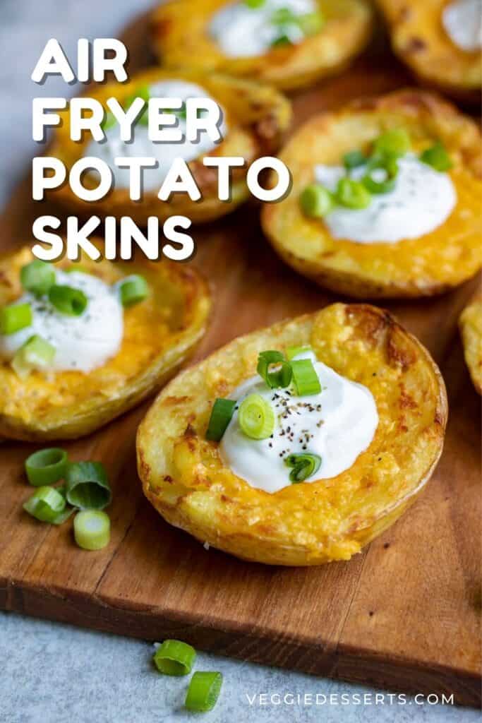 Wooden tray of potato skins with text: Air Fryer Potato Skins.