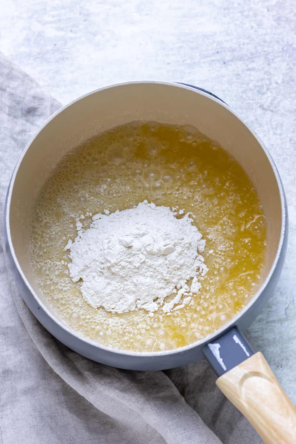 Flour in a pot of melted butter.