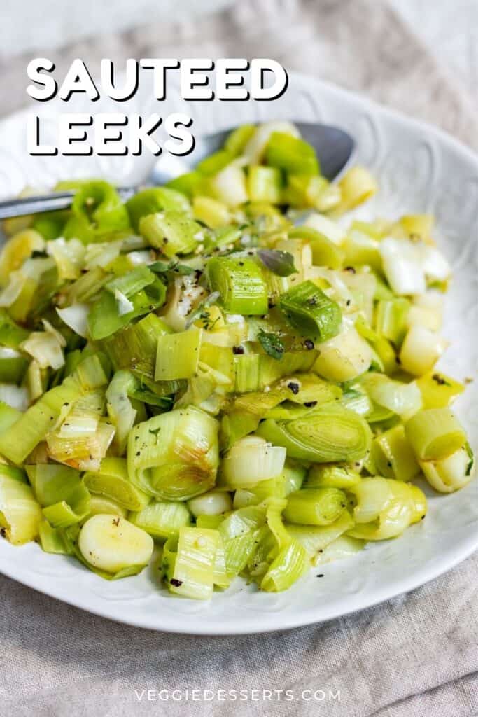 Serving dish of leeks, with text: sautéed leeks.