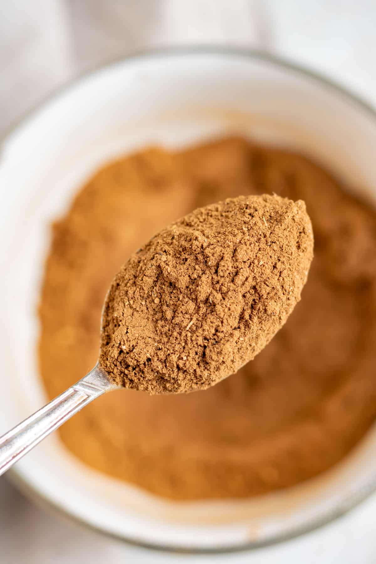 Close up of a teaspoon of spice.