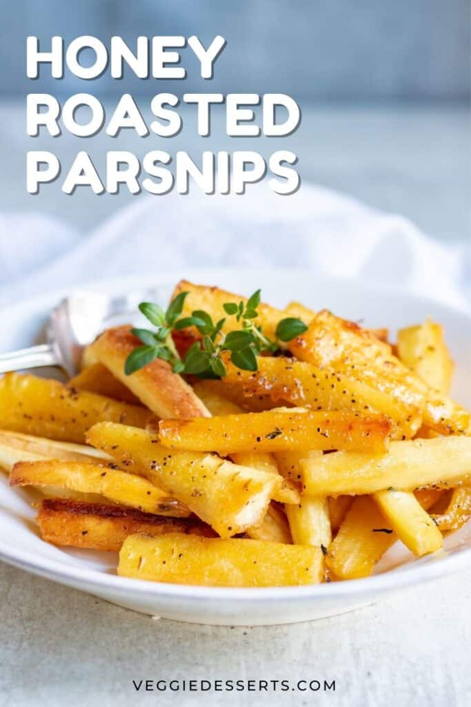 A dish of parsnips, with text: Honey Roasted Parsnips.