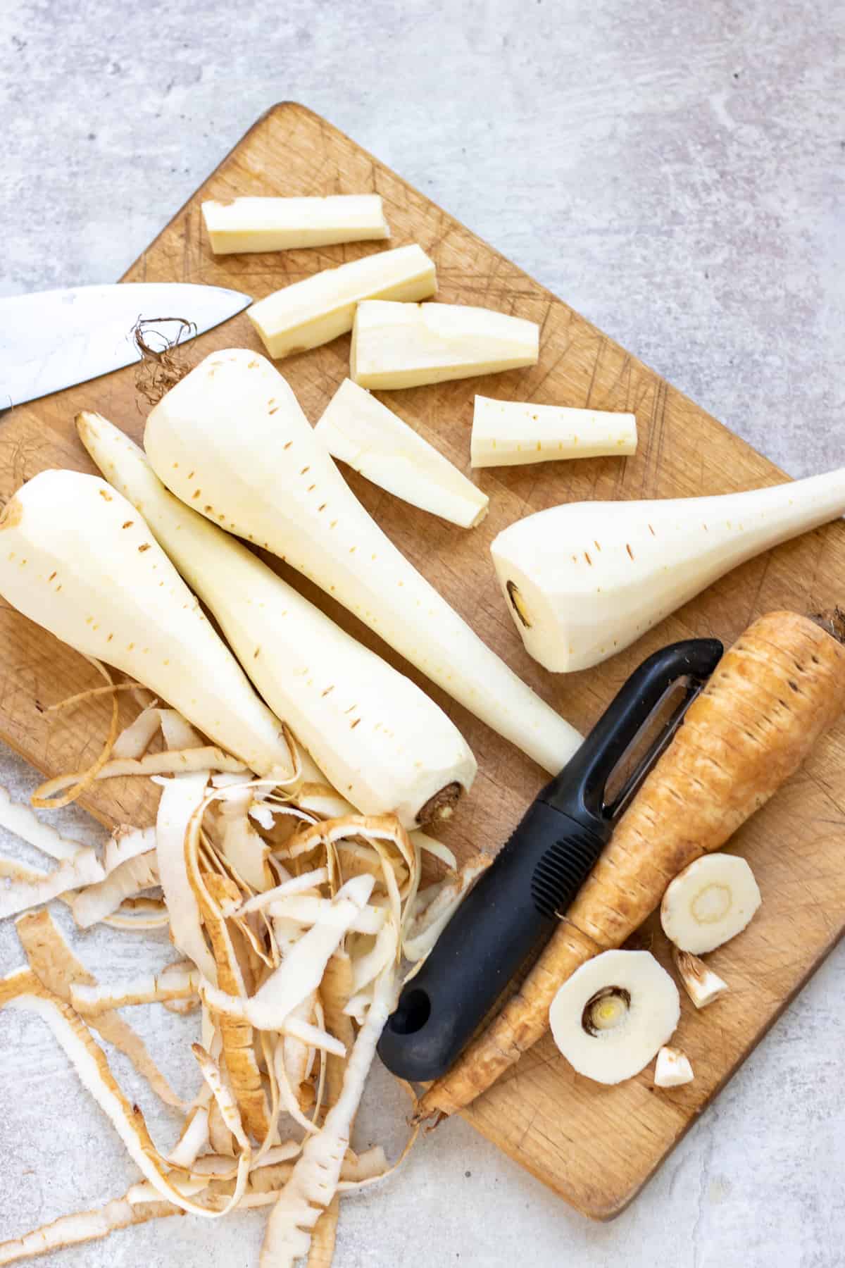 Peeling and cutting parsnips.