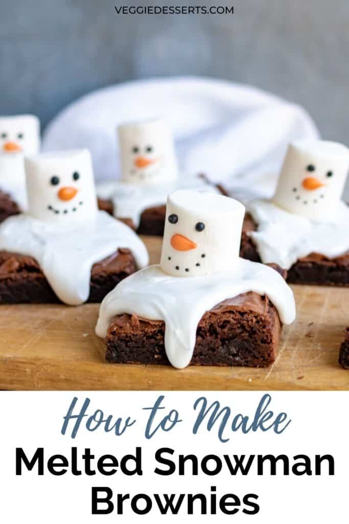 Brownies topped with icing and marshmallows with text: how to make melted snowman brownies.