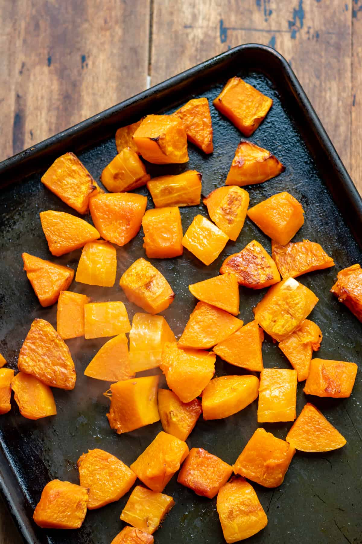Roasted squash on a tray.