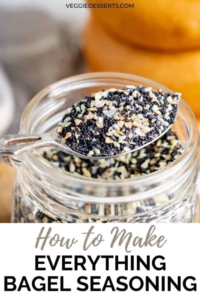 Spoonful of bagel seasoning in a jar, with text: How to make everything bagel seasoning.