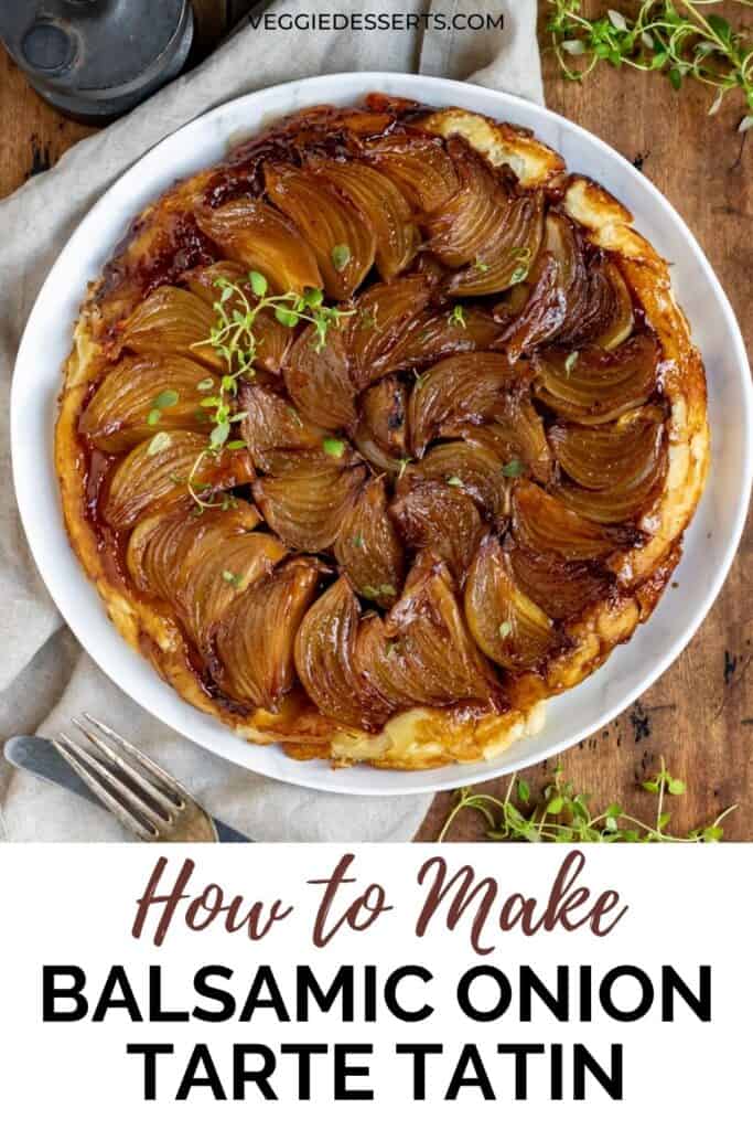 Wooden table with an onion pie, with text: How to make balsamic onion tarte tatin.