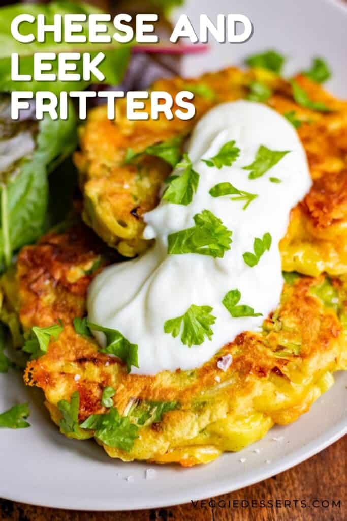 Close up of fritters on a plate, with text: Cheese and Leek Fritters.
