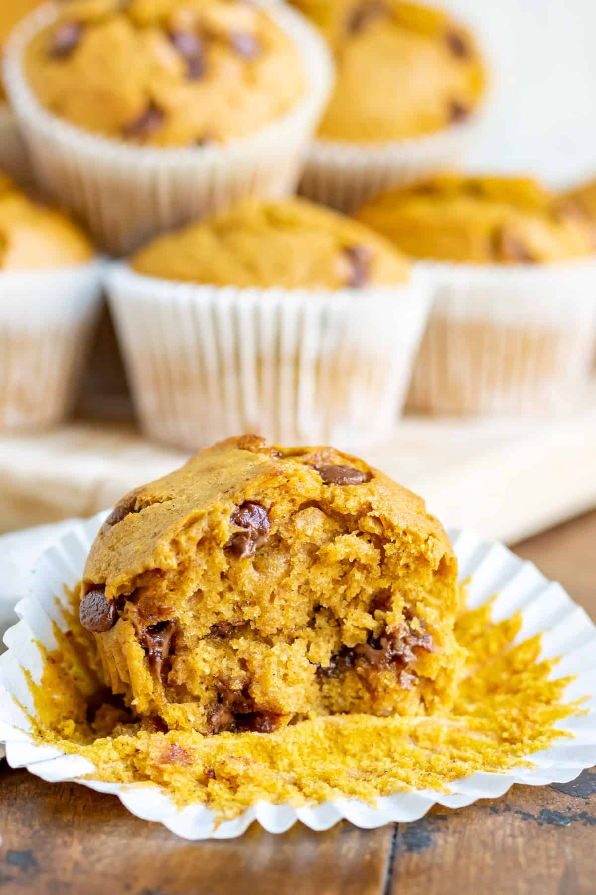 A muffin with a bite out.