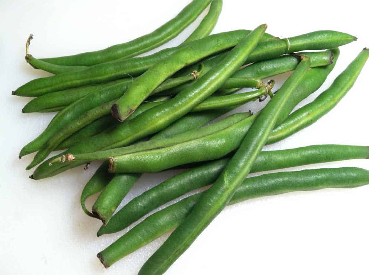 Green beans on a table.