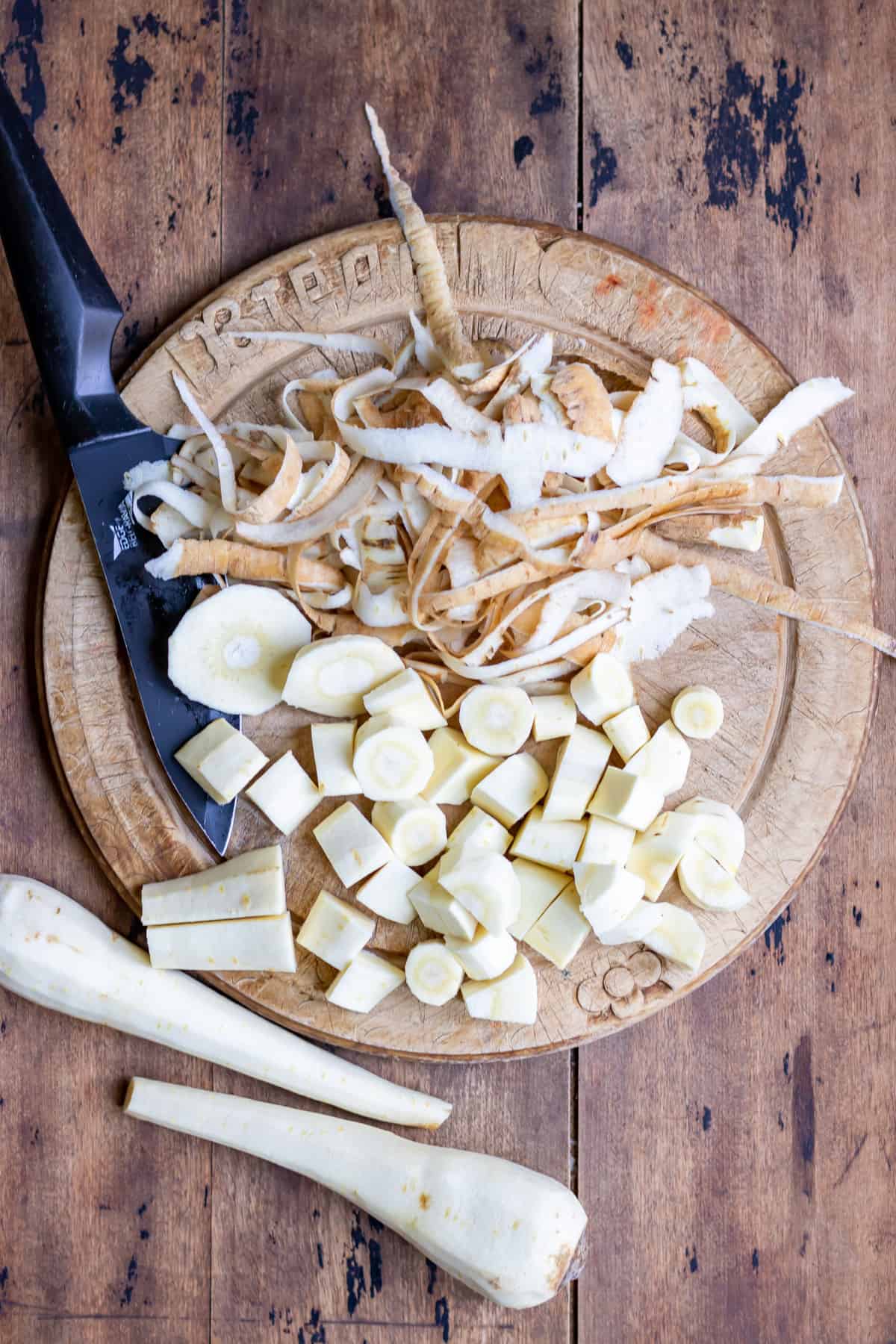 Peeling and chopping parsnips.