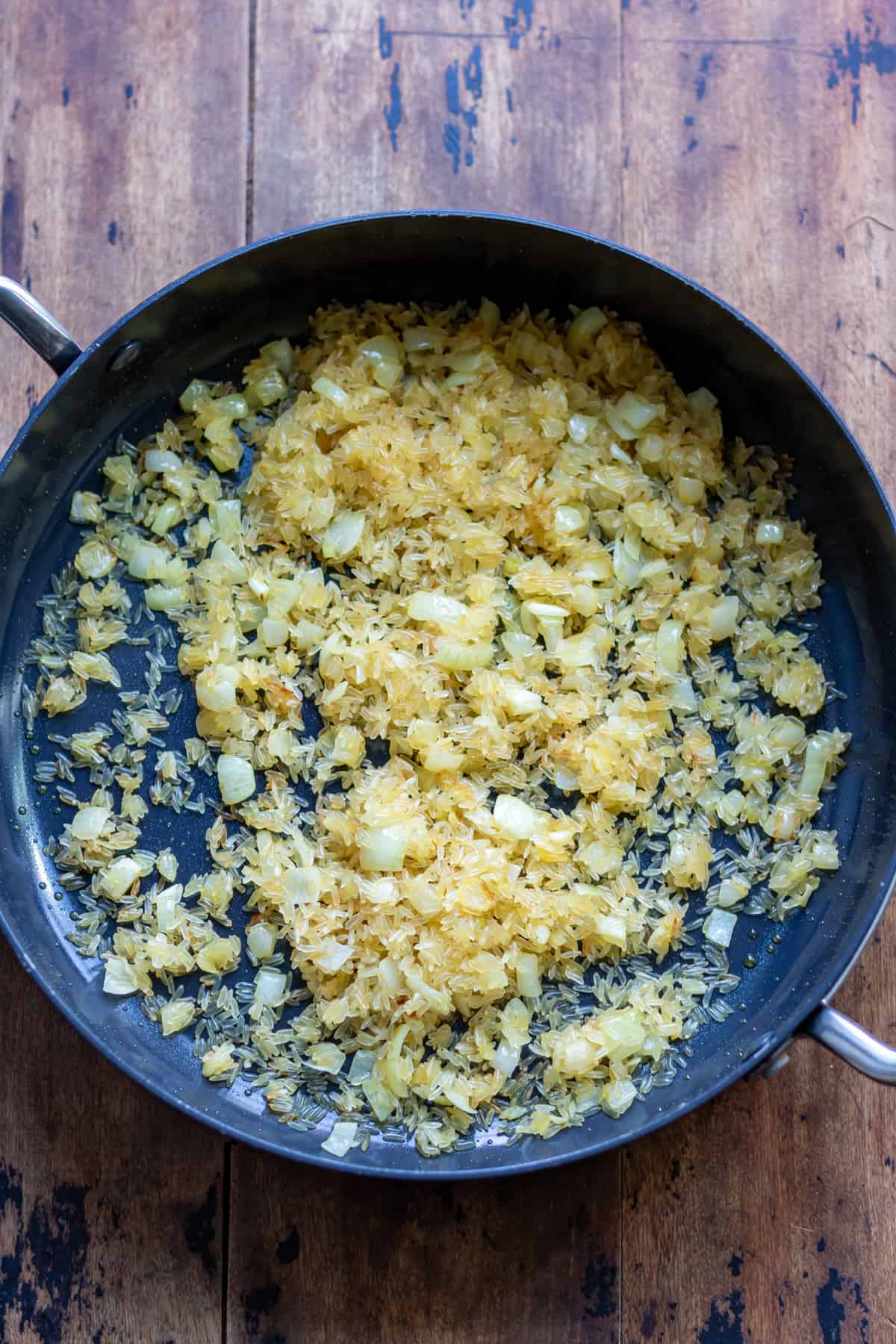 Cooked onions with rice stirred in.