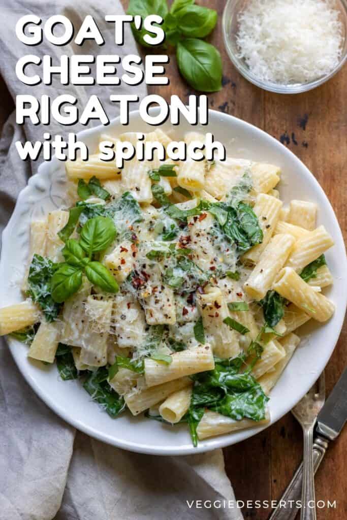 Plate of pasta, with text: Goat Cheese Rigatoni with spinach.