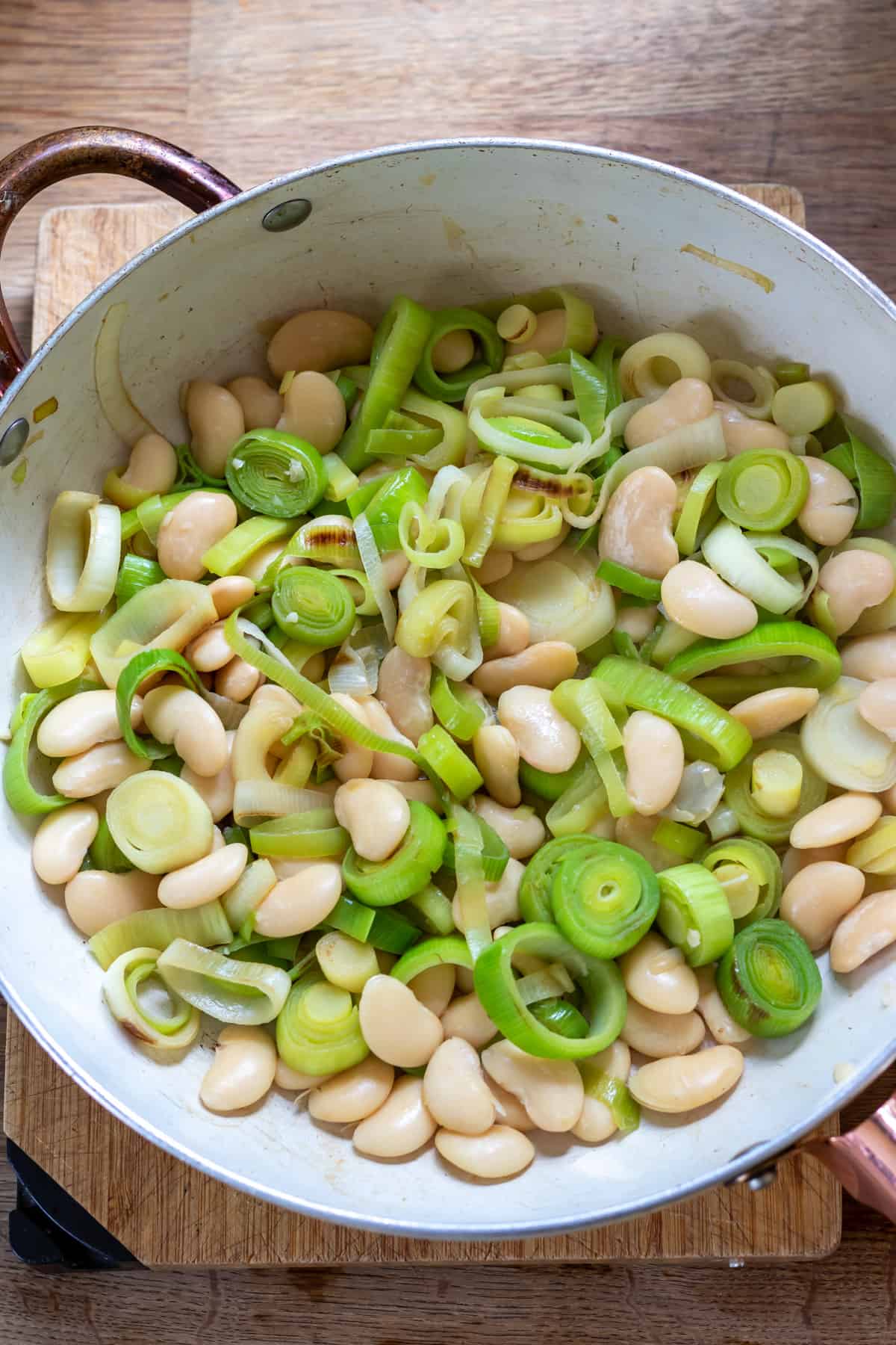 Beans tossed with cooked leeks.