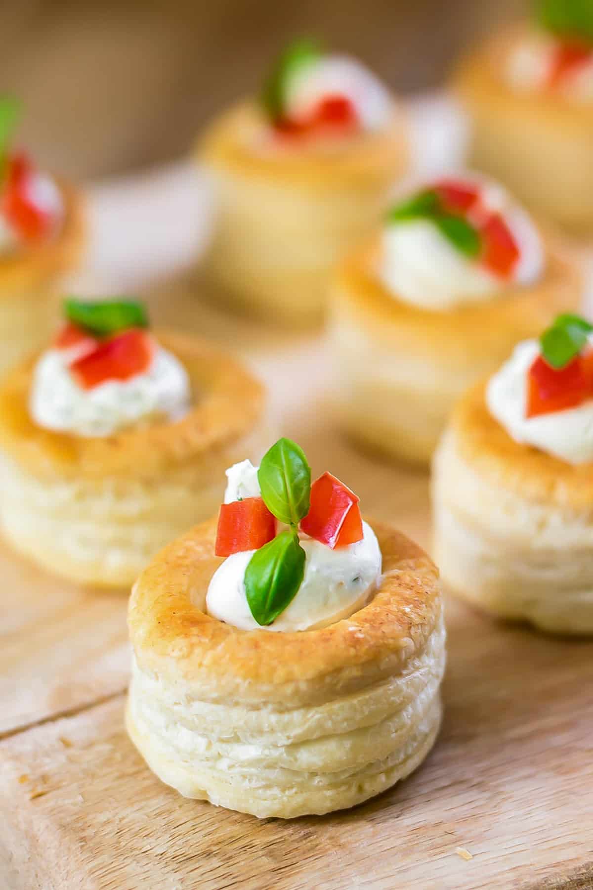 Close up of a vol au vent with herb and garlic cream cheese filling.