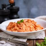 Plate of pink sauce pasta.