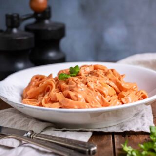 Plate of pink sauce pasta.