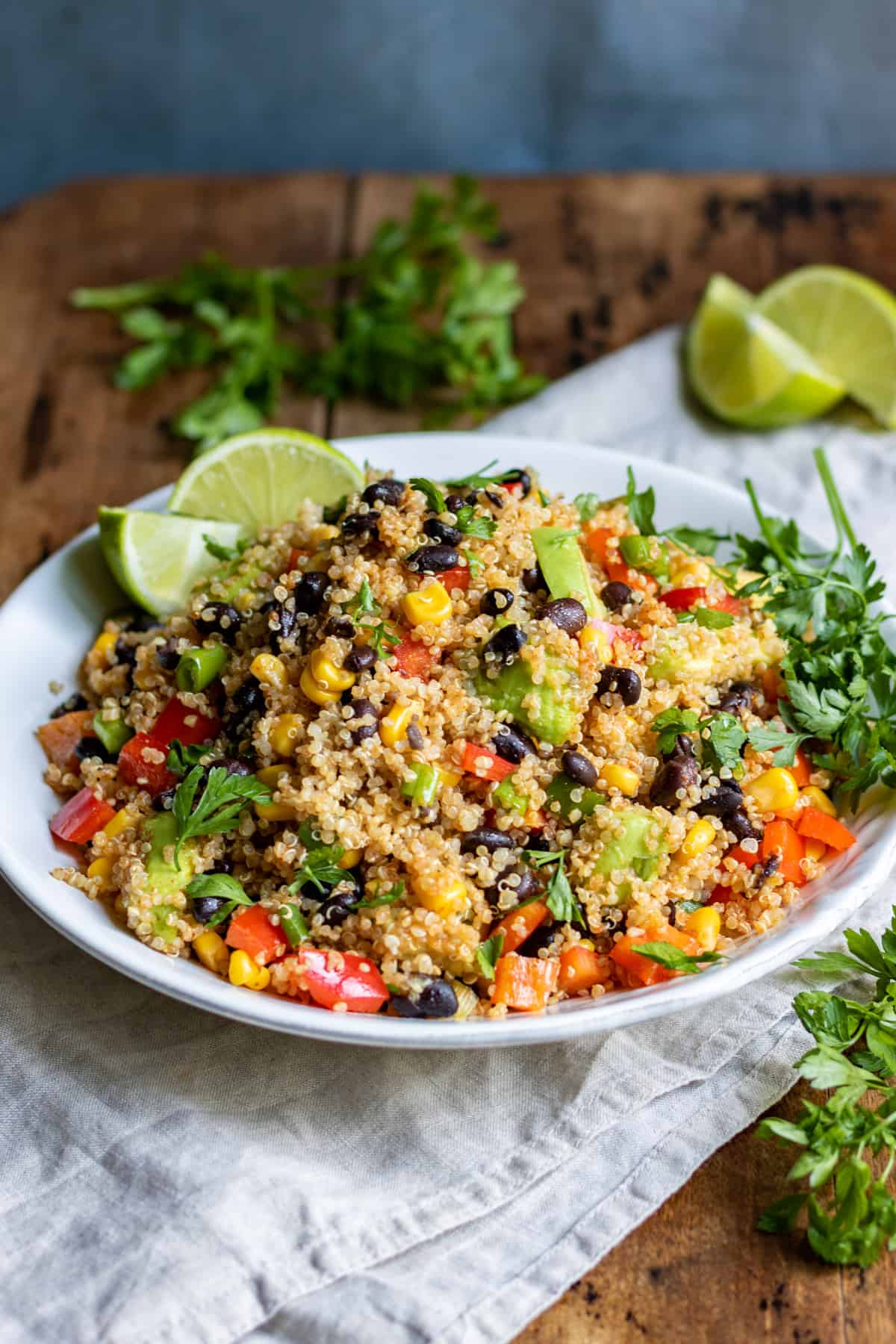 Table with a dish of quinoa and black beans.