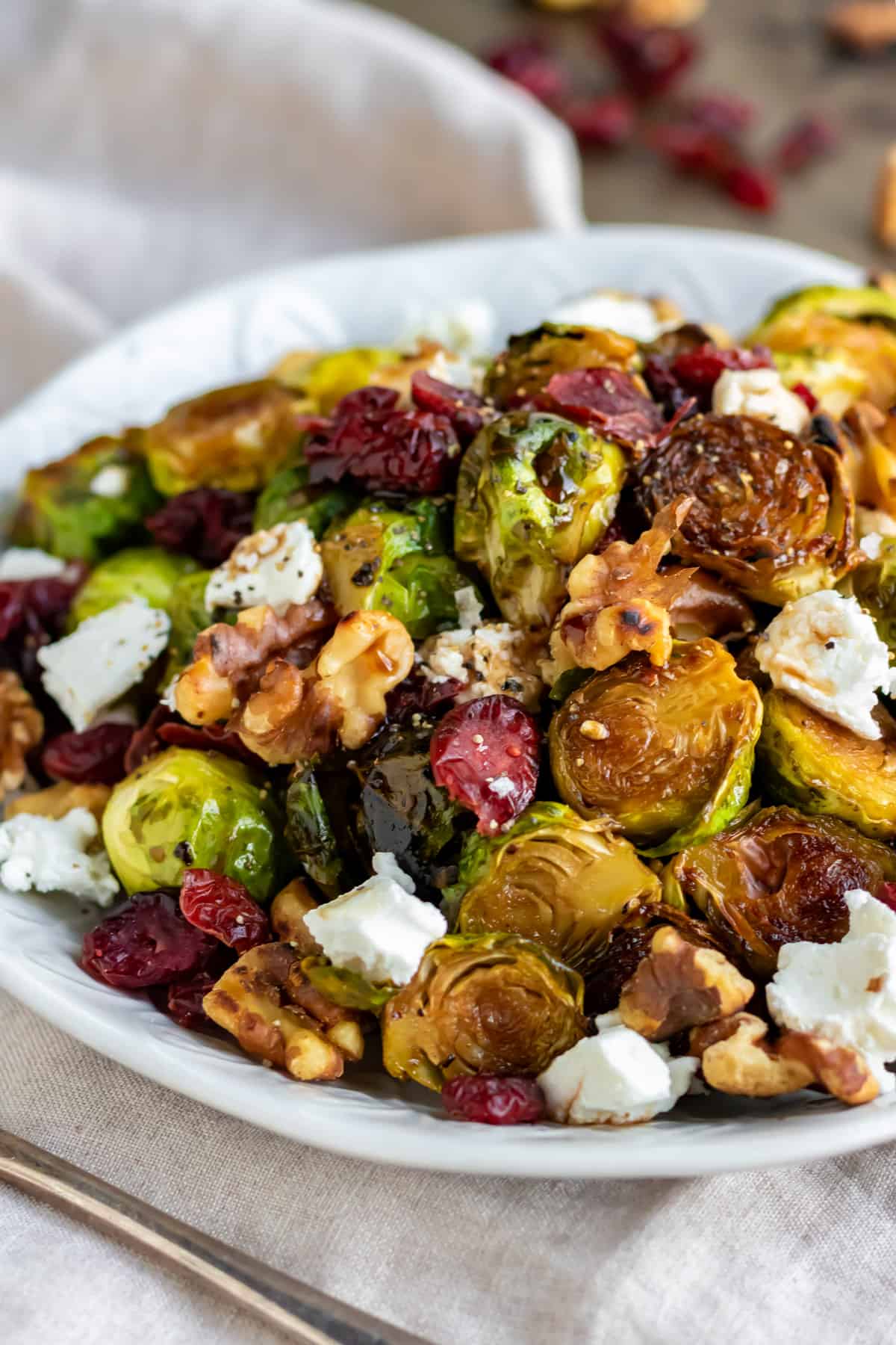 Close up of a serving dish of roasted sprouts.