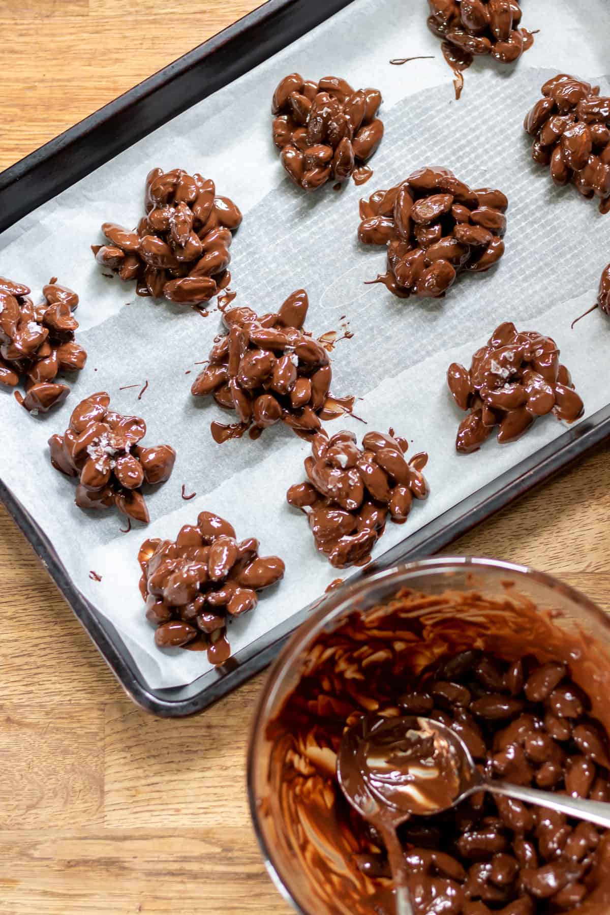 Making chocolate almond clusters.