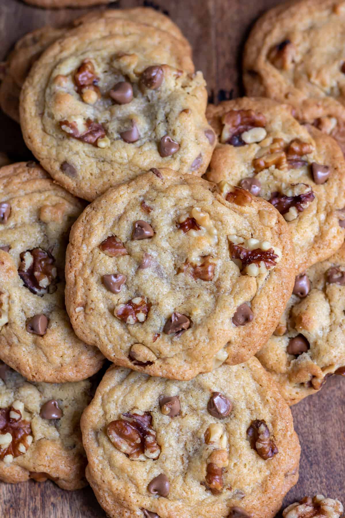 A pile of chocolate chip walnut cookies.