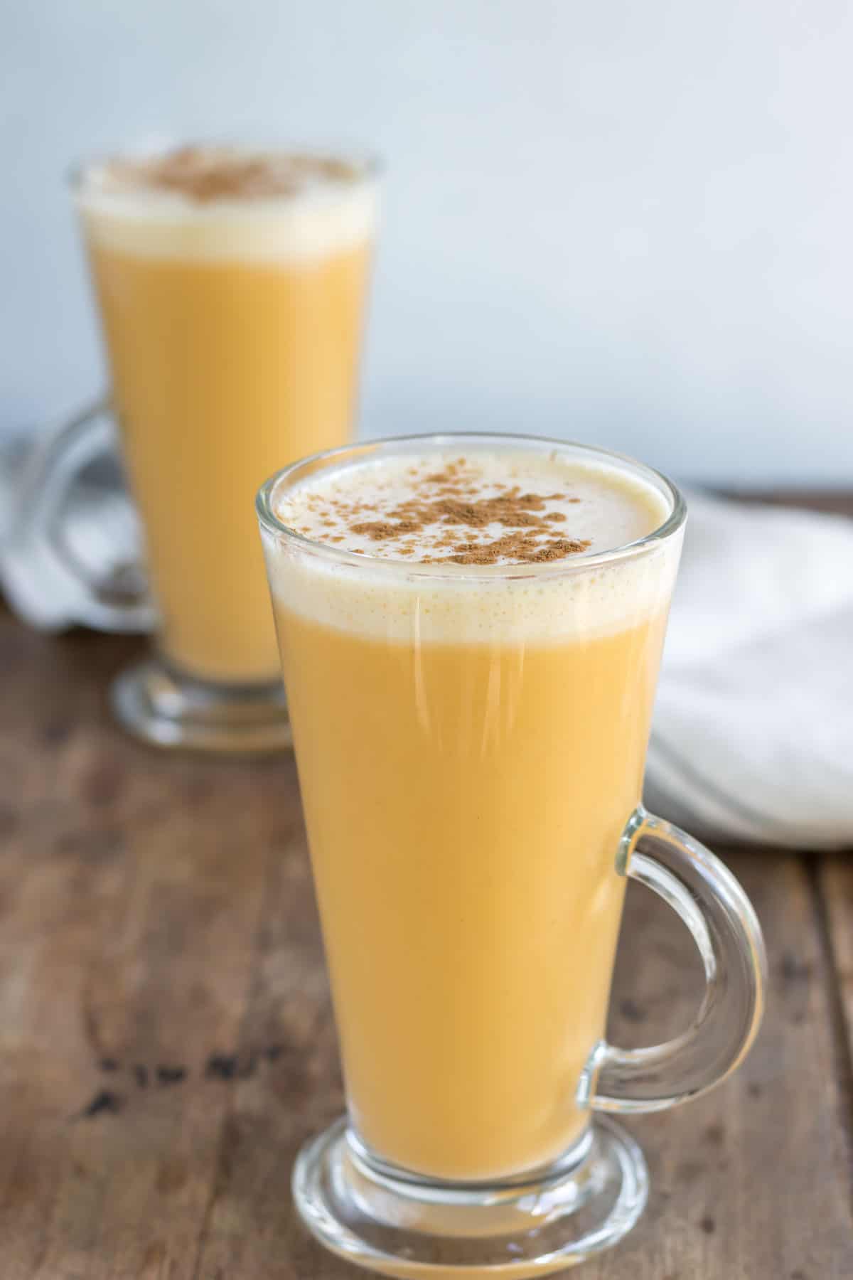 Latte glass filled with homemade sweet potato latte.