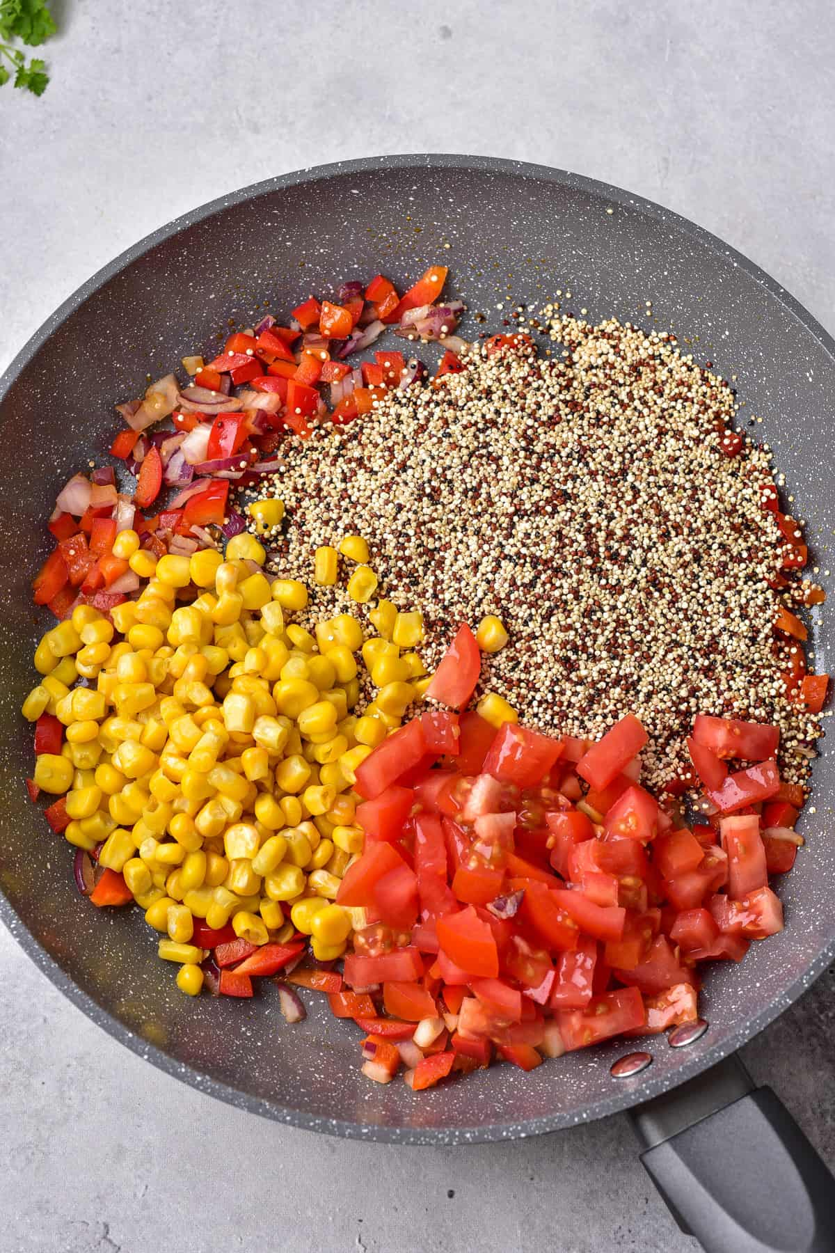 Pan of quinoa and vegetables.