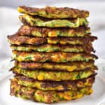 A tall stack of zucchini and corn fritters.