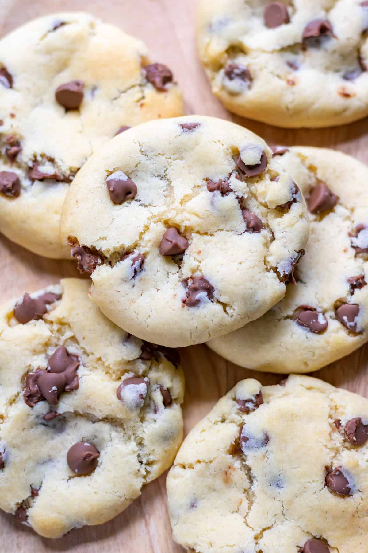 Close up of a pile of chocolate chip condensed milk cookies.