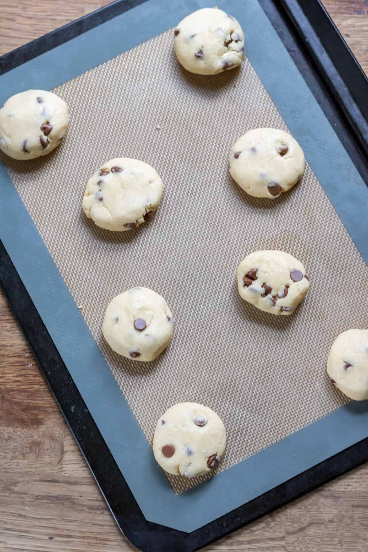 Cookies on a cookie sheet ready to bake.