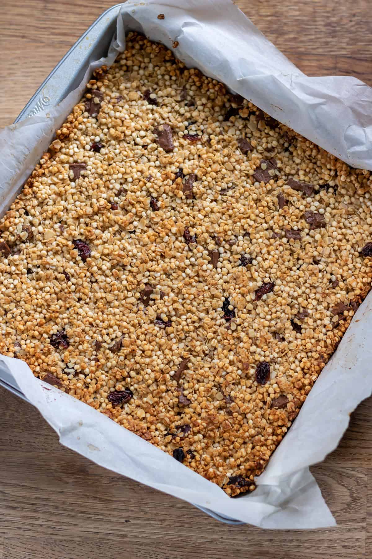 Baked chocolate quinoa squares in a pan.