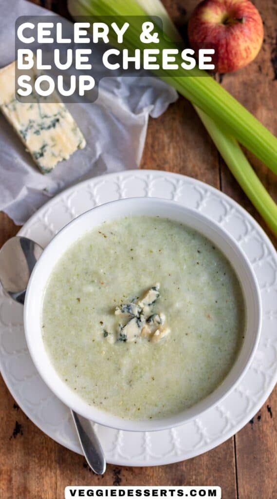 Bowl of soup on a wooden table with title: Celery and Blue Cheese Soup.