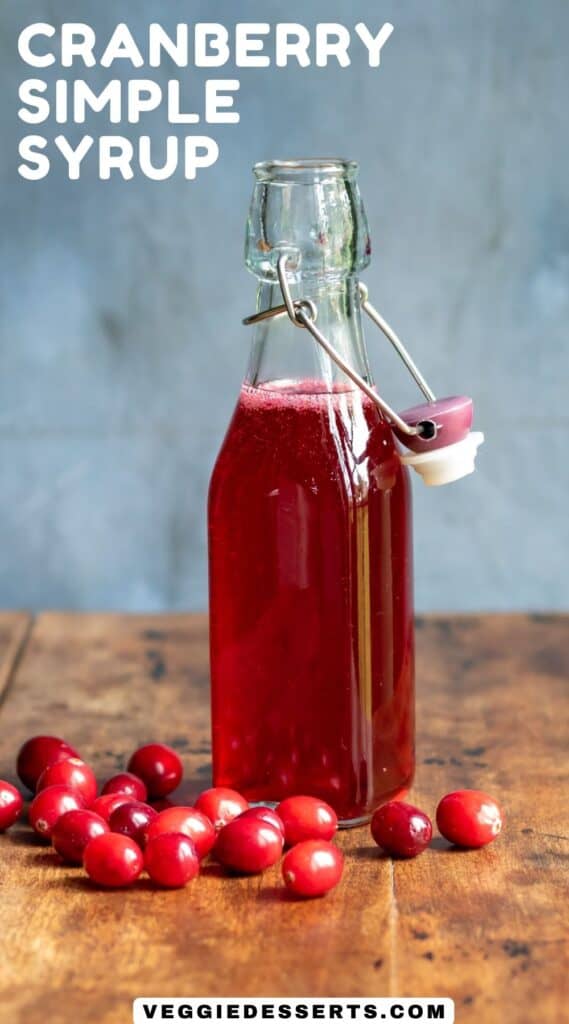 Bottle of syrup, with text: Cranberry Simple Syrup.